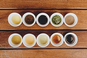 bowls of different marinades for grilling
